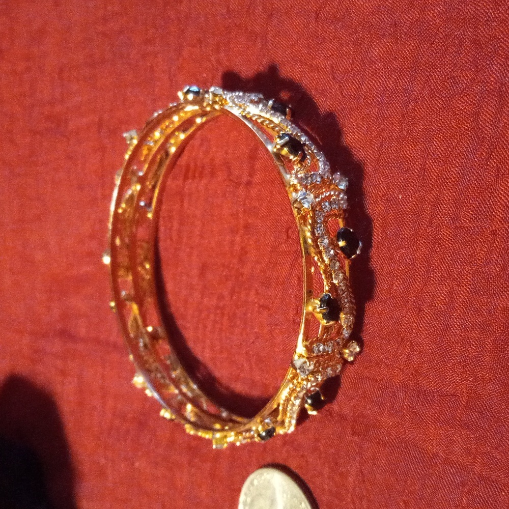 Gold tone crystal encrusted bracelet
